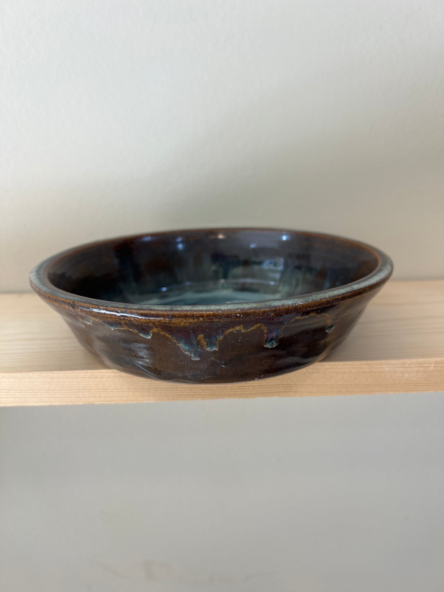 Bowl - wide shallow Brown w/ wisps of turquoise