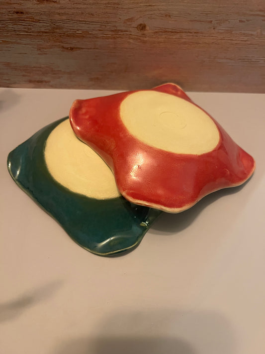 Bowl - altered rim with bubble glaze. Raspberry