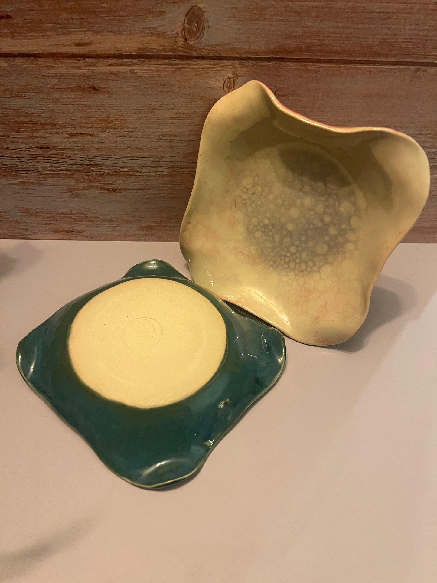 Bowl - altered rim with bubble glaze. Turquoise