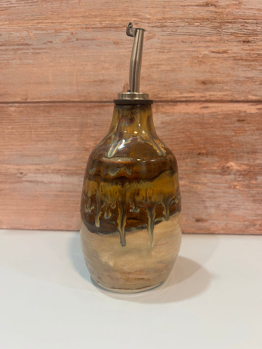 Oil Pourer -  creams & browns with drips of blue. Thumb imprint for easy pouring